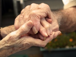 bigstock-Old-Couple-Holding-Hands-2041049-e1475264193565